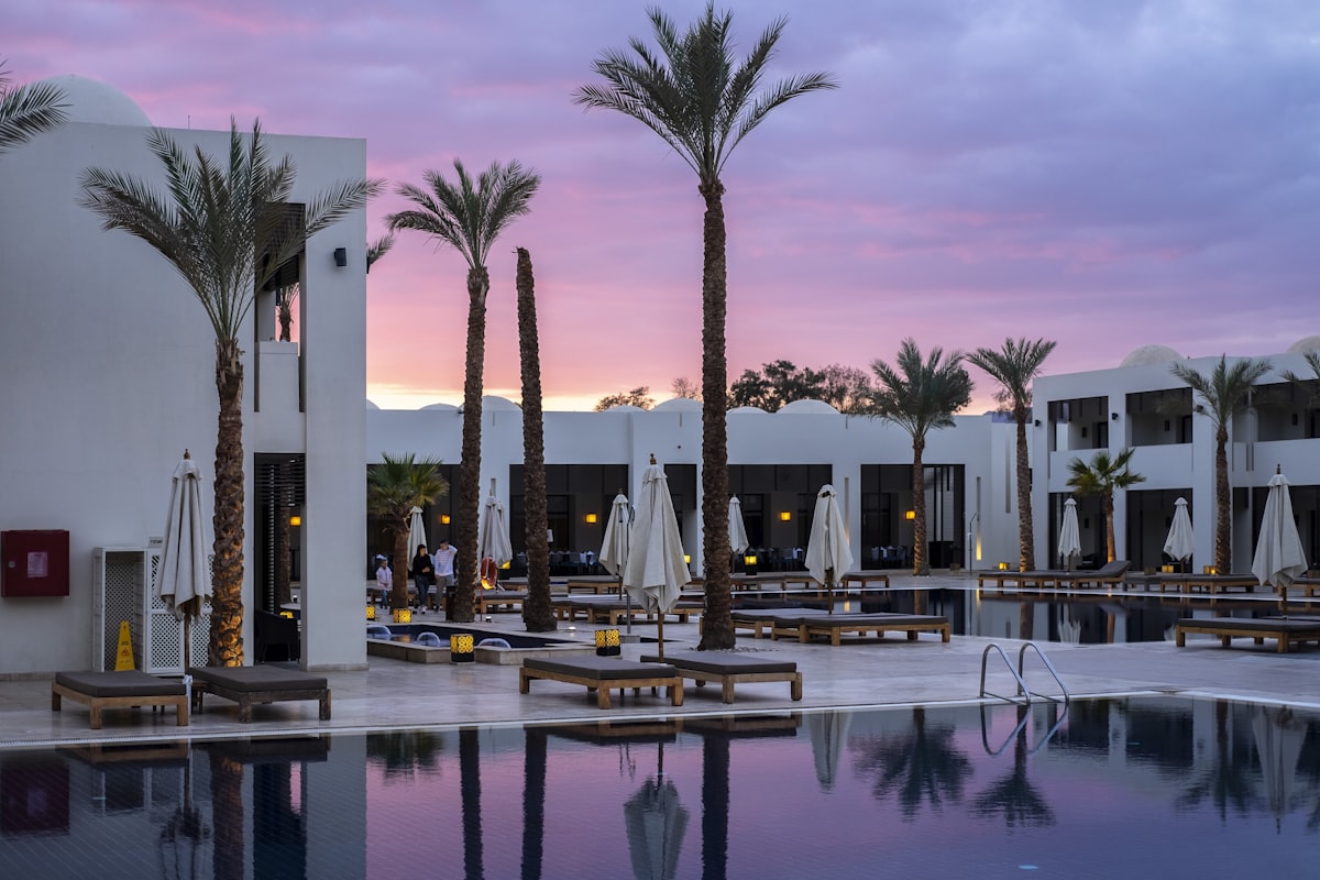 The infinity pool at our resort in Cabo. All-inclusive means all-inclusive -- every cocktail, every meal, every sunset. We saved over $2,800 compared to booking directly. Not a typo.